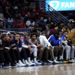 
              The Golden State Warriors bench looks on, as the team rests most of its starters, in the first half of an NBA basketball game against the New Orleans Pelicans in New Orleans, Friday, Nov. 4, 2022. (AP Photo/Gerald Herbert)
            