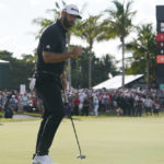 
              Dustin Johnson pumps his fist after putting on the 18th green during the final round of the LIV Golf Team Championship at Trump National Doral Golf Club, Sunday, Oct. 30, 2022, in Doral, Fla. (AP Photo/Lynne Sladky)
            