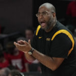 
              Norfolk State head coach Robert Jones claps during the first half of an NCAA college basketball game against Houston, Tuesday, Nov. 29, 2022, in Houston. (AP Photo/Kevin M. Cox)
            