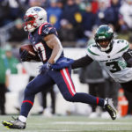 
              New England Patriots running back Damien Harris (37) tries to outrun New York Jets safety Jordan Whitehead (3) during the first half of an NFL football game, Sunday, Nov. 20, 2022, in Foxborough, Mass. (AP Photo/Michael Dwyer)
            