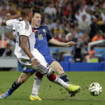 
              FILE - Germany's Jerome Boateng kicks the ball away from Argentina's Lionel Messi during the World Cup final soccer match between Germany and Argentina at the Maracana Stadium in Rio de Janeiro, Brazil, Sunday, July 13, 2014. (AP Photo/Felipe Dana, File)
            