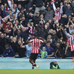 
              Brentford's Ivan Toney celebrates after scoring his side's second goal during the English Premier League soccer match between Manchester City and Brentford, at the Etihad stadium in Manchester, England, Saturday, Nov.12, 2022. (AP Photo/Dave Thompson)
            