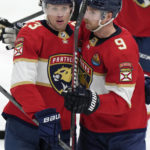 
              Florida Panthers center Carter Verhaeghe (23) is congratulated by center Sam Bennett (9) after Verhaeghe scored a goal during the second period of an NHL hockey game against the Dallas Stars, Thursday, Nov. 17, 2022, in Sunrise, Fla. (AP Photo/Wilfredo Lee)
            