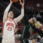 
              Ohio State's Rebeka Mikulasikova, left, shoots over Wright State's Bryce Nixon during the second half of an NCAA college basketball game on Wednesday, Nov. 23, 2022, in Columbus, Ohio. (AP Photo/Jay LaPrete)
            