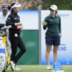 
              Lydia Ko, of New Zealand, left, and Leona Maguire, of Ireland, right, talk while waiting to hit on the fifth tee during the final round of the LPGA CME Group Tour Championship golf tournament, Sunday, Nov. 20, 2022, at the Tiburón Golf Club in Naples, Fla. (AP Photo/Lynne Sladky)
            