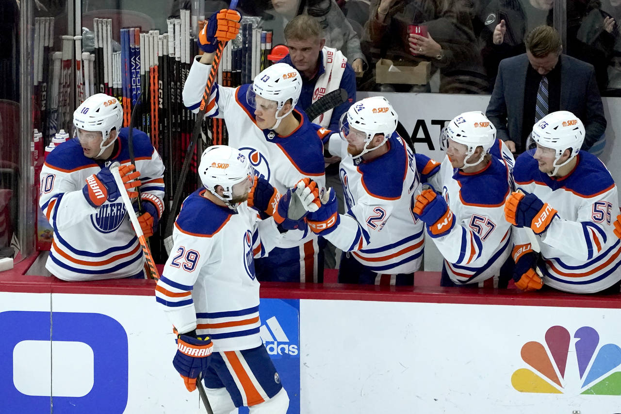 Edmonton Oilers' Leon Draisaitl (29) celebrates his goal with teammates during the second period of...