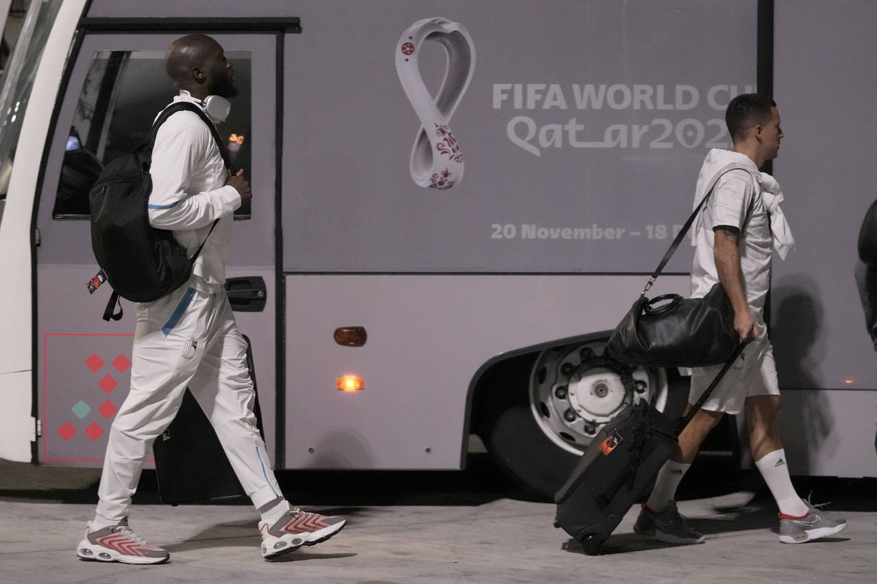 Eden Hazard, right, and Romelu Lukaku of Belgium's national soccer team arrive with teammates at Ha...