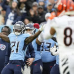 
              Tennessee Titans cornerback Roger McCreary (21) celebrates blocking a pass against the Cincinnati Bengals during the first half of an NFL football game, Sunday, Nov. 27, 2022, in Nashville, Tenn. (AP Photo/Gerald Herbert)
            