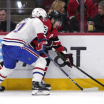 
              Chicago Blackhawks right wing Patrick Kane, right, controls the puck against Montreal Canadiens defenseman Kaiden Guhle during the first period of an NHL hockey game in Chicago, Friday, Nov. 25, 2022. (AP Photo/Nam Y. Huh)
            