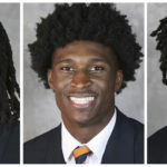 
              This combo of undated image provided by University of Virginia Athletics shows NCAA college football players, from left, Devin Chandler, Lavel Davis Jr. and D'Sean Perry. The three Virginia football players were killed in a shooting, Sunday, Nov. 13, 2022, in Charlottesville, Va., while returning from a class trip to see a play. (University of Virginia Athletics via AP)
            
