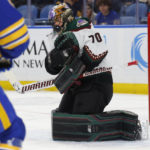 
              Arizona Coyotes goaltender Karel Vejmelka (70) makes a save during the first period of an NHL hockey game against the Buffalo Sabres, Tuesday, Nov. 8, 2022, in Buffalo, N.Y. (AP Photo/Jeffrey T. Barnes)
            