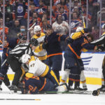 
              Nashville Predators and Edmonton Oilers rough it up during the second period of an NHL hockey game Tuesday, Nov. 1, 2022, in Edmonton, Alberta. (Jason Franson/The Canadian Press via AP)
            