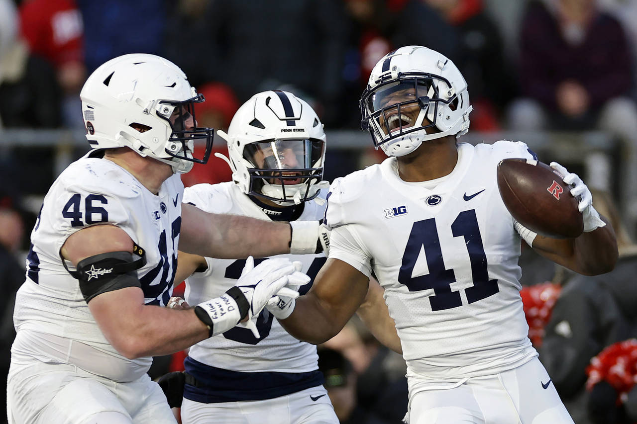 Penn State linebacker Kobe King (41) reacts to scoring a touchdown after recovering a Rutgers fumbl...