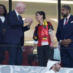 
              Belgium Foreign Minister Hadja Lahbib, wearing a "One Love" armband, talks with FIFA President Gianni Infantino, left, on the tribune during the World Cup group F soccer match between Belgium and Canada, at the Ahmad Bin Ali Stadium in Doha, Qatar, Wednesday, Nov. 23, 2022. (AP Photo/Natacha Pisarenko)
            