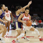 
              Ohio State's Madison Greene, right, tries to dribble past North Alabama's Hina Suzuki during the first half of an NCAA college basketball game on Sunday, Nov. 27, 2022, in Columbus, Ohio. (AP Photo/Jay LaPrete)
            