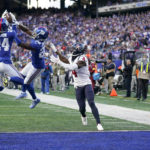 
              New York Giants safety Dane Belton (24) intercepts a pass intended for Houston Texans wide receiver Phillip Dorsett (4) during the fourth quarter of an NFL football game, Sunday, Nov. 13, 2022, in East Rutherford, N.J. (AP Photo/Seth Wenig)
            