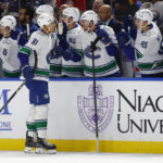 
              Vancouver Canucks center Dakota Joshua (81) celebrates his goal during the first period of an NHL hockey game against the Buffalo Sabres, Tuesday, Nov. 15, 2022, in Buffalo, N.Y. (AP Photo/Jeffrey T. Barnes)
            