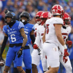 
              Kentucky wide receiver Dane Key (6) celebrates getting a first down against Louisville during the first half of an NCAA college football game in Lexington, Ky., Saturday, Nov. 26, 2022. (AP Photo/Michael Clubb)
            