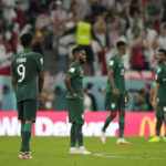 
              Saudi Arabia players react after Poland's Robert Lewandowski scored his side's second goal during the World Cup group C soccer match between Poland and Saudi Arabia, at the Education City Stadium in Al Rayyan , Qatar, Saturday, Nov. 26, 2022. (AP Photo/Francisco Seco)
            