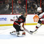 
              New Jersey Devils right wing Nathan Bastian (14) watches the puck enter the net on his shot on Ottawa Senators goaltender Anton Forsberg (31) during first period of an NHL hockey game in Ottawa, on Saturday, Nov. 19, 2022.  (Justin Tang /The Canadian Press via AP)
            