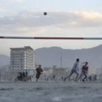
              Afghans play soccer on a dirt pitch in the city of Kabul, Afghanistan, Friday, Nov. 11, 2022. (AP Photo/Ebrahim Noroozi)
            