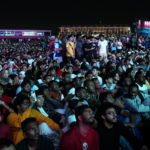 
              Fans watch the World Cup, group A soccer match between Qatar and Ecuador at the fan zone in Doha, Sunday, Nov. 20, 2022. (AP Photo/Petr David Josek)
            