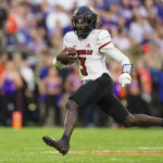 
              Louisville quarterback Malik Cunningham (3) runs with the ball in the first half of an NCAA college football game against Clemson, Saturday, Nov. 12, 2022, in Clemson, S.C. (AP Photo/Jacob Kupferman)
            