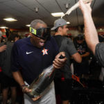 
              Houston Astros manager Dusty Baker Jr. celebrates in the locker room after their 4-1 World Series win against the Philadelphia Phillies in Game 6 on Saturday, Nov. 5, 2022, in Houston. (AP Photo/David J. Phillip)
            