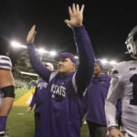 
              Kansas State head coach Chris Klieman, center, thanks the fans after defeating Baylor in an NCAA college football game, Saturday, Nov. 12, 2022, in Waco, Texas. (AP Photo/Jerry Larson)
            