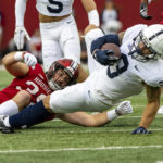 
              Penn State wide receiver Parker Washington (3) is tackled by Indiana defensive back Patrick Finley (39) during the first half of an NCAA college football game, Saturday, Nov. 5, 2022, in Bloomington, Ind. (AP Photo/Doug McSchooler)
            