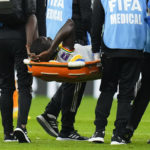 
              Senegal's Cheikhou Kouyate is taken from the field on a stretcher during the World Cup, group A soccer match between Senegal and Netherlands at the Al Thumama Stadium in Doha, Qatar, Monday, Nov. 21, 2022. (AP Photo/Petr David Josek)
            