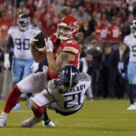 
              Kansas City Chiefs tight end Noah Gray (83) catches a pass as Tennessee Titans cornerback Roger McCreary (21) defends during overtime of an NFL football game Sunday, Nov. 6, 2022, in Kansas City, Mo. The Chiefs won 20-17. (AP Photo/Ed Zurga)
            