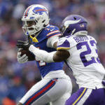 
              Buffalo Bills wide receiver Stefon Diggs tries to evade Minnesota Vikings cornerback Andrew Booth Jr. (23) in the second half of an NFL football game, Sunday, Nov. 13, 2022, in Orchard Park, N.Y. (AP Photo/Joshua Bessex)
            