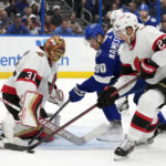 
              Ottawa Senators goaltender Anton Forsberg (31) makes a save on a shot by Tampa Bay Lightning center Vladislav Namestnikov (90) as -pot23n= clears away the puck during the second period of an NHL hockey game Tuesday, Nov. 1, 2022, in Tampa, Fla. (AP Photo/Chris O'Meara)
            