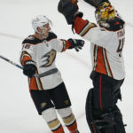 
              Anaheim Ducks center Ryan Strome, left, celebrates with goaltender Anthony Stolarz after the Ducks defeated the San Jose Sharks in an NHL hockey game in San Jose, Calif., Saturday, Nov. 5, 2022. The Ducks won 5-4 in a shootout. (AP Photo/Jeff Chiu)
            