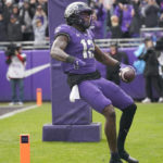 
              TCU tight end Geor'Quarius Spivey (12) celebrates scoring a touchdown during the first half of an NCAA college football game against Iowa State in Fort Worth, Texas, Saturday, Nov. 26, 2022. (AP Photo/LM Otero)
            