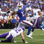 
              Buffalo Bills wide receiver Gabe Davis (13) tries to evade Minnesota Vikings cornerback Patrick Peterson and safety Harrison Smith (22) in the first half of an NFL football game, Sunday, Nov. 13, 2022, in Orchard Park, N.Y. (AP Photo/Jeffrey T. Barnes)
            