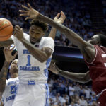 
              North Carolina forward Leaky Black (1) pulls in a rebound against College of Charleston forward Babacar Faye (35) during the second half of an NCAA college basketball game Friday, Nov. 11, 2022, in Chapel Hill, N.C. (AP Photo/Chris Seward)
            