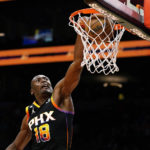 
              Phoenix Suns' Bismack Biyombo dunks against the Detroit Pistons during the second half of an NBA basketball game in Phoenix, Friday, Nov. 25, 2022. (AP Photo/Darryl Webb)
            