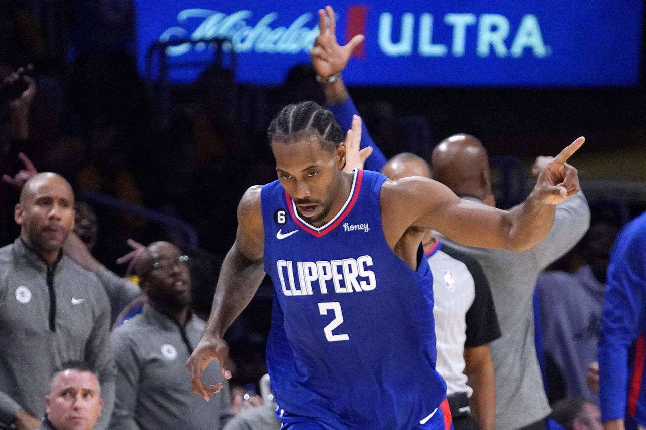 Los Angeles Clippers forward Kawhi Leonard gestures after scoring during the second half of an NBA ...