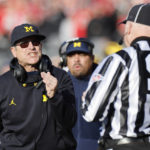 
              Michigan head coach Jim Harbaugh argues with a game official during the second half of an NCAA college football game against Ohio State on Saturday, Nov. 26, 2022, in Columbus, Ohio. (AP Photo/Jay LaPrete)
            