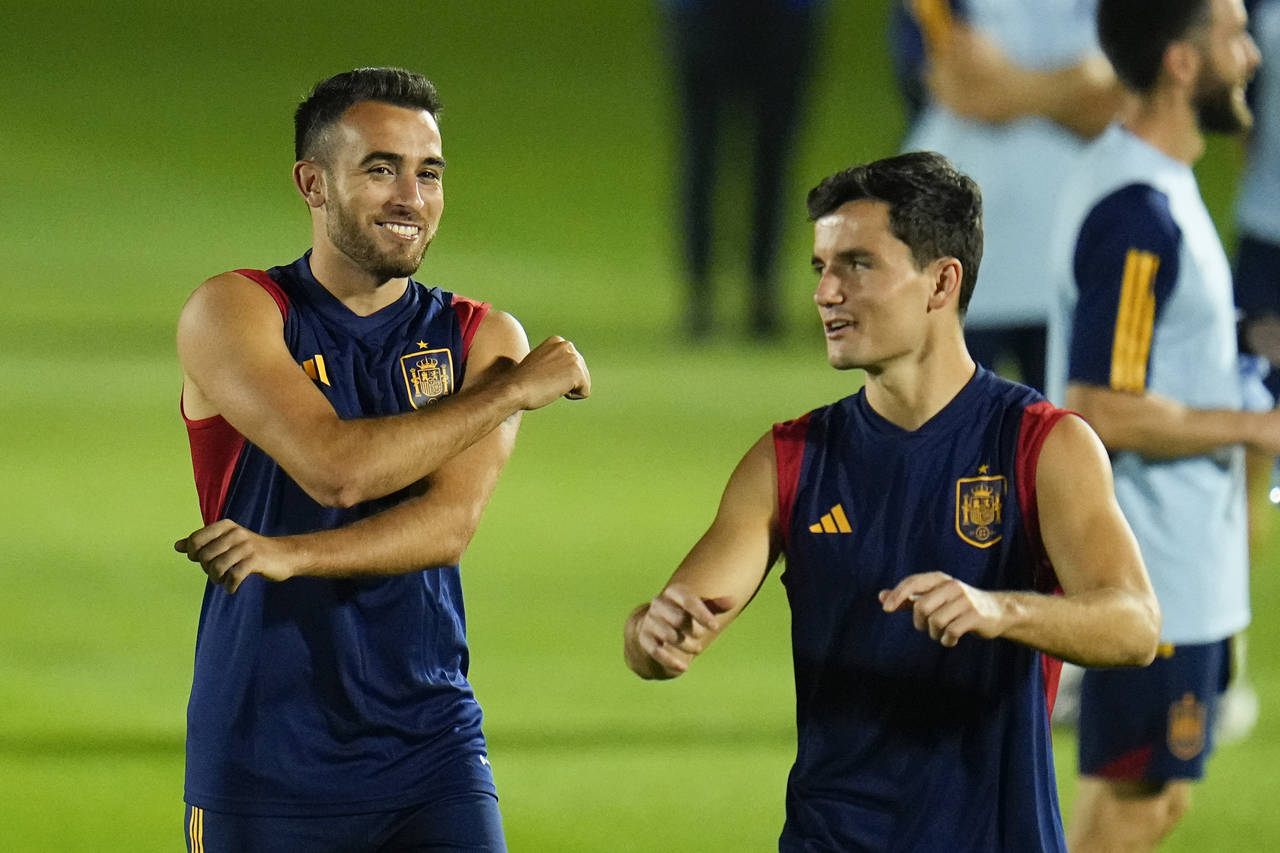 Spain's Eric Garcia, left, and Hugo Guillamon work out during an official training session at Qatar...