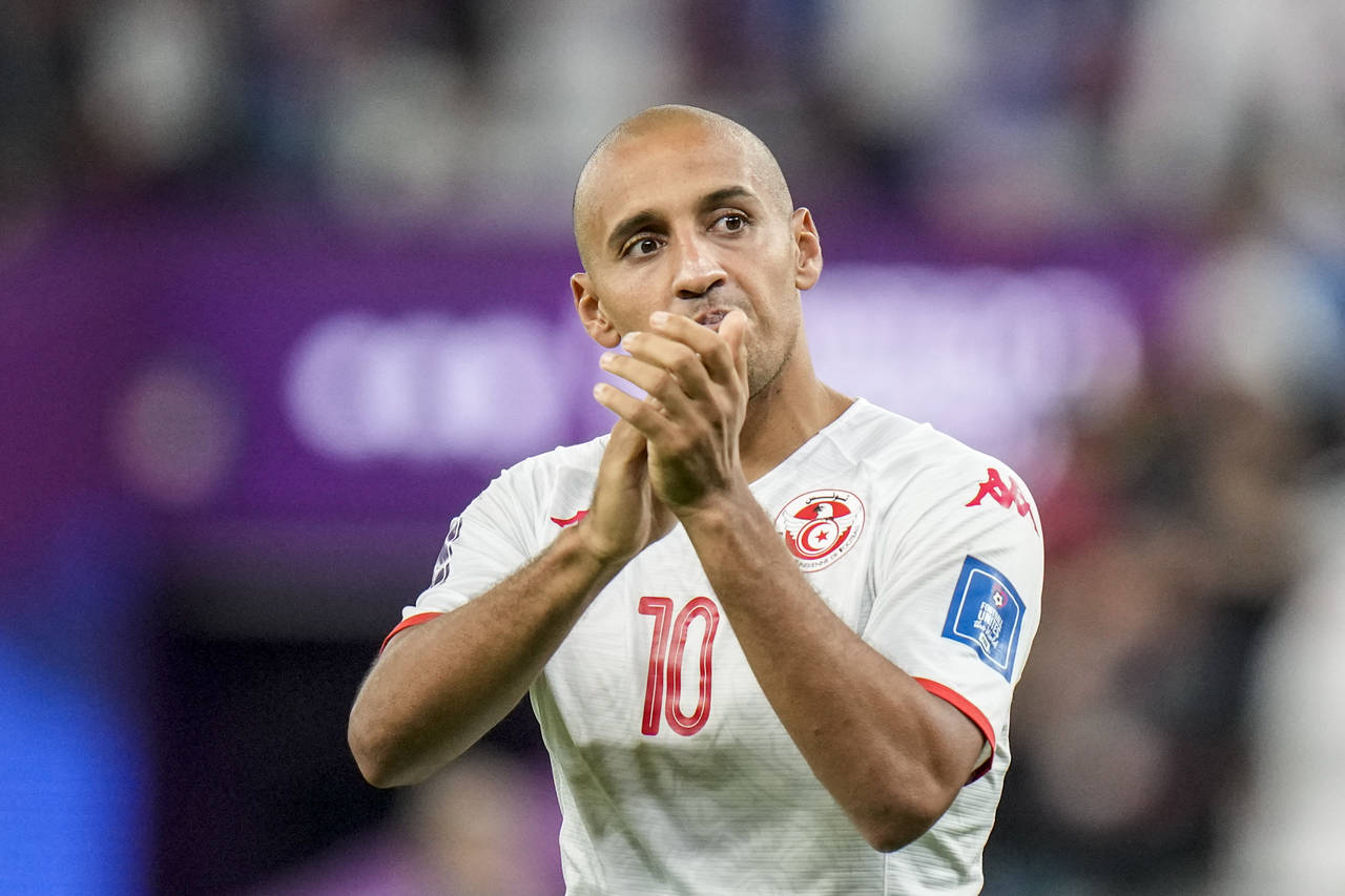 Tunisia's Wahbi Khazri applauds at the end of the match during the World Cup group D soccer match b...
