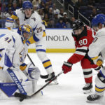 
              Buffalo Sabres goaltender Craig Anderson (41) blocks a shot by New Jersey Devils left wing Tomas Tatar (90) during the second period of an NHL hockey game Friday, Nov. 25, 2022, in Buffalo, N.Y. (AP Photo/Joshua Bessex)
            
