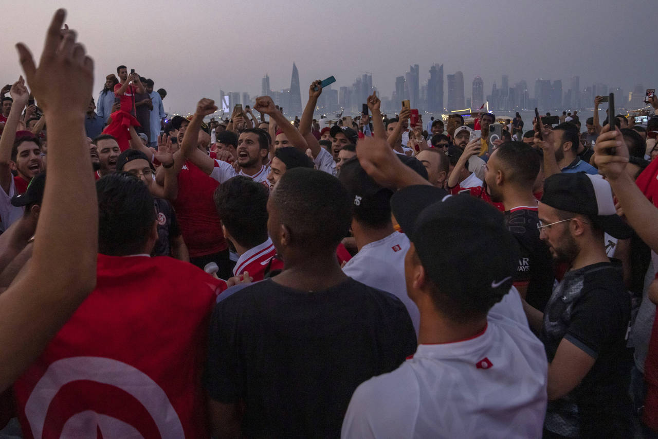 Tunisians gather to celebrate and represent their community in front of the official FIFA World Cup...