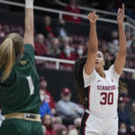 
              Stanford guard Haley Jones (30) shoots a 3-point basket over Cal Poly guard Niki Kovacikova (1) during the first half of an NCAA college basketball game in Stanford, Calif., Wednesday, Nov. 16, 2022. (AP Photo/Godofredo A. Vásquez)
            