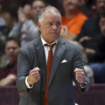 
              Virginia Tech head coach Mike Young celebrates a 3-point basket by Hunter Cattoor against Lehigh during the first half of an NCAA college basketball game Thursday, Nov. 10, 2022, in Blacksburg, Va. (Matt Gentry/The Roanoke Times via AP)
            