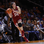 
              Indiana forward Mackenzie Holmes (54) saves the ball from going out of bounds during the second half of an NCAA college basketball game against Tennessee, Monday, Nov. 14, 2022, in Knoxville, Tenn. (AP Photo/Wade Payne)
            