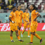 
              Virgil van Dijk of the Netherlands, middle, with teammates at the end of the World Cup group A soccer match between Netherlands and Ecuador, at the Khalifa International Stadium in Doha, Qatar, Friday, Nov. 25, 2022. (AP Photo/Themba Hadebe)
            