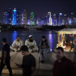
              People gather at the Corniche in Doha, Qatar, Wednesday, Nov. 23, 2022. (AP Photo/Jorge Saenz)
            